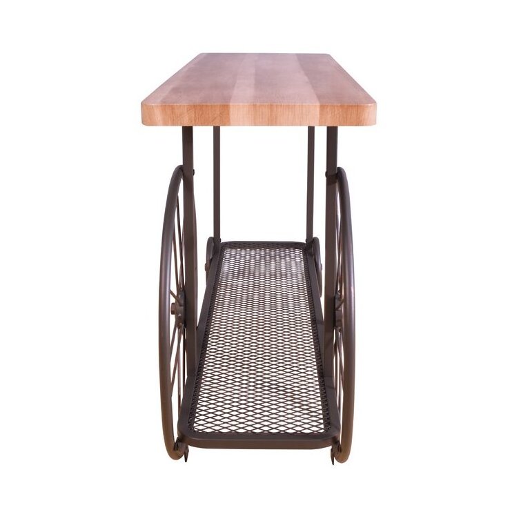 Latest Design Console Table Features A Butcher Block Top And Metal Mesh Lower Shelf Supported By Wheels In The Form Of A Cart