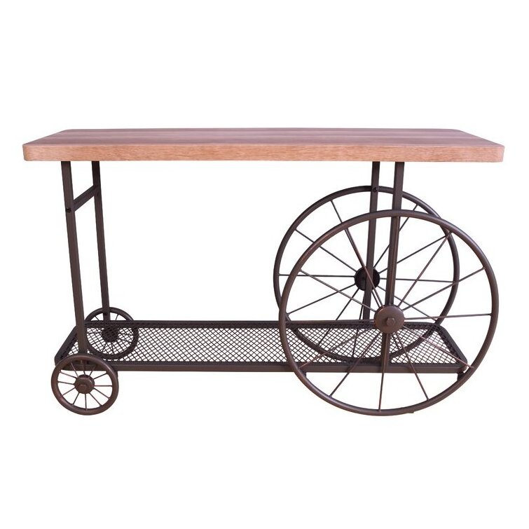 Latest Design Console Table Features A Butcher Block Top And Metal Mesh Lower Shelf Supported By Wheels In The Form Of A Cart