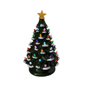 LED lighted 9.5" pre-lit ceramic green holiday tree with snow effect