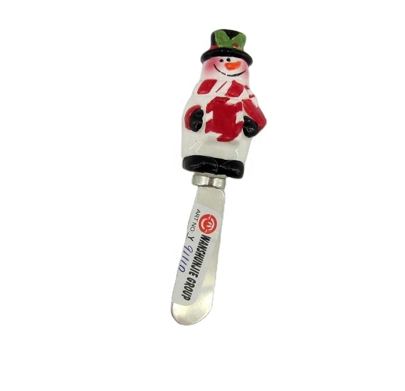 Spreader with ceramic snowman handle for Christmas decoration