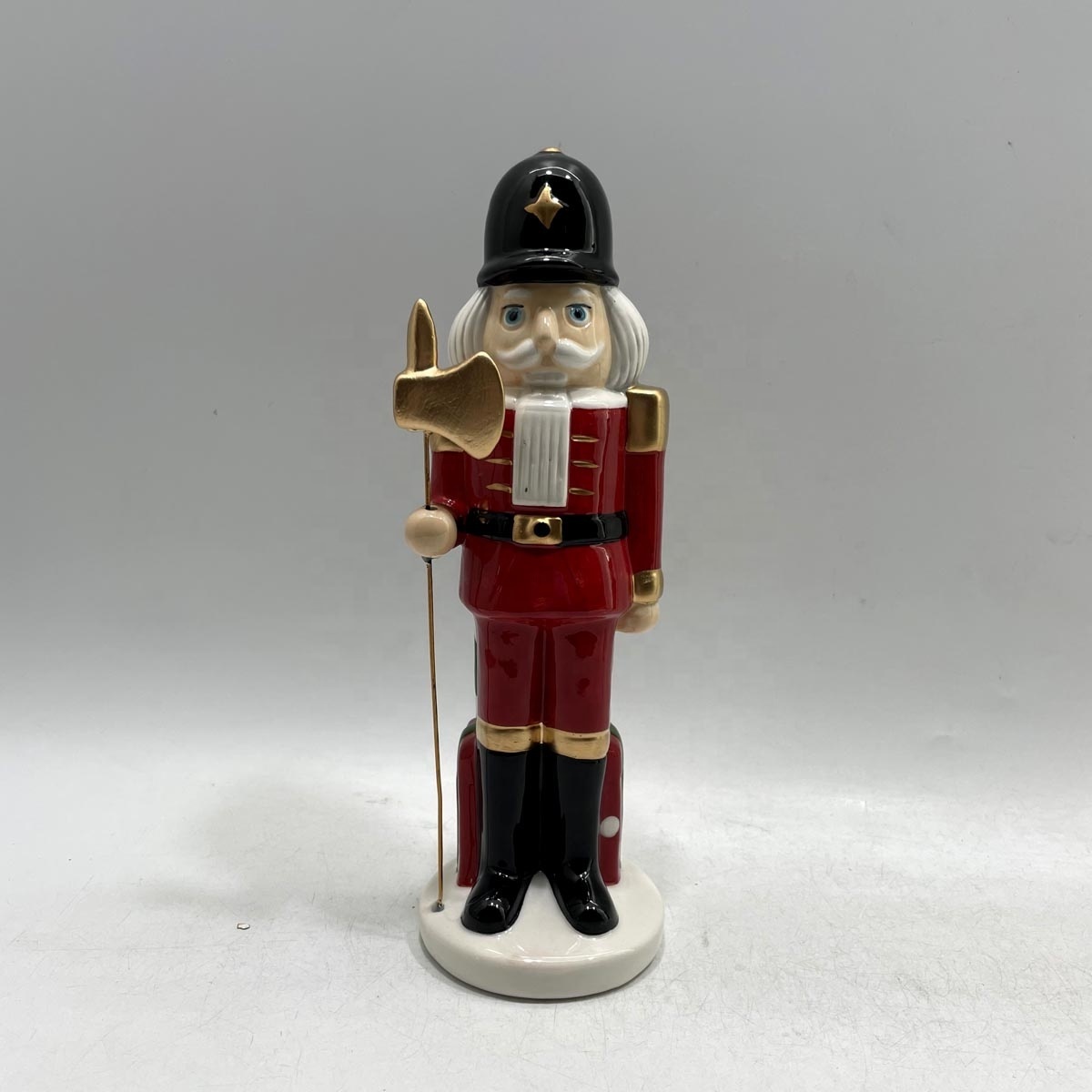 Hand-painted ceramic 8 inch Christmas nutcracker