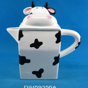 Hand-painted ceramic cow shaped kettle