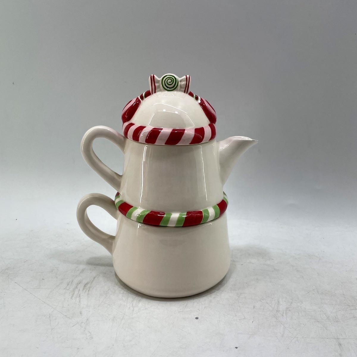 Funky snowman shaped ceramic kettle with mug set