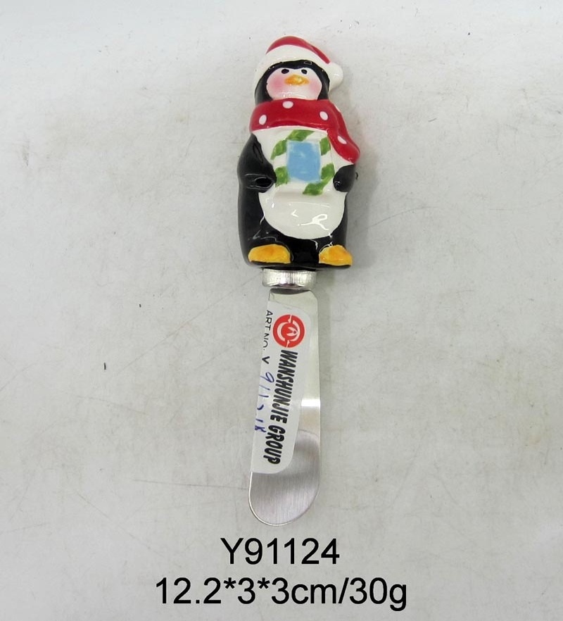 Spreader with ceramic snowman handle for Christmas decoration