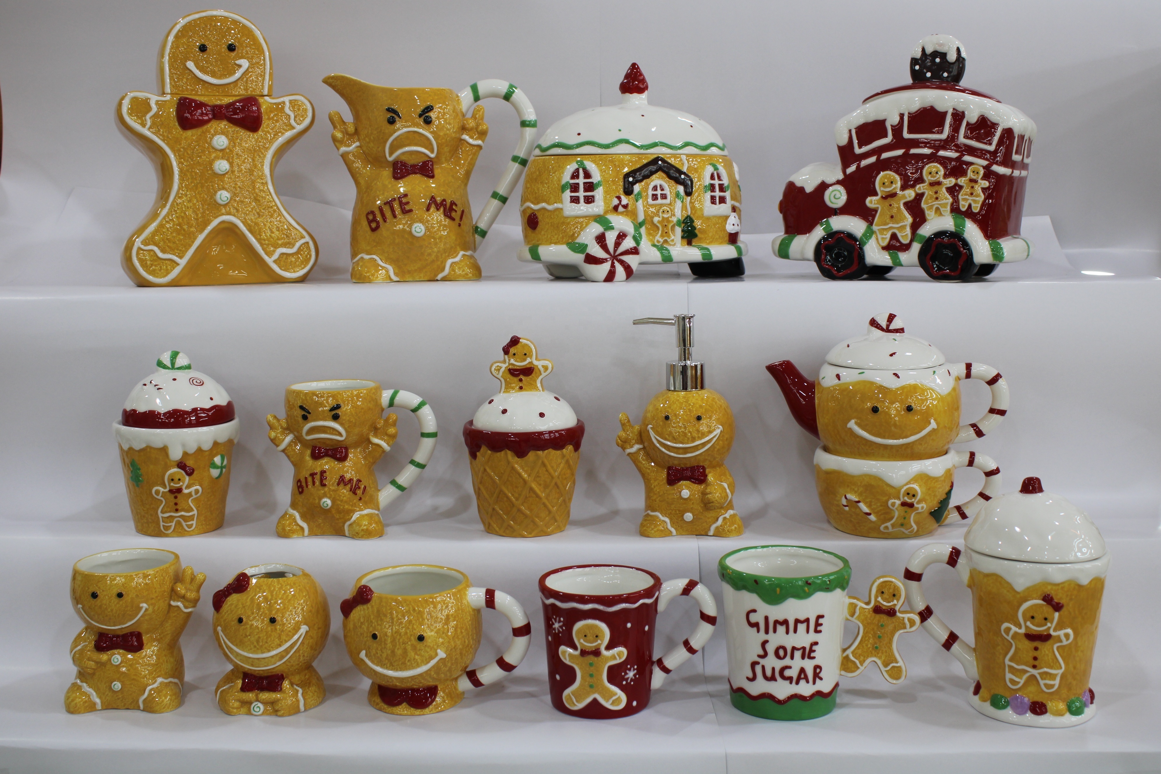 Cheese spreader with hand-painted ceramic gingerbread man handle