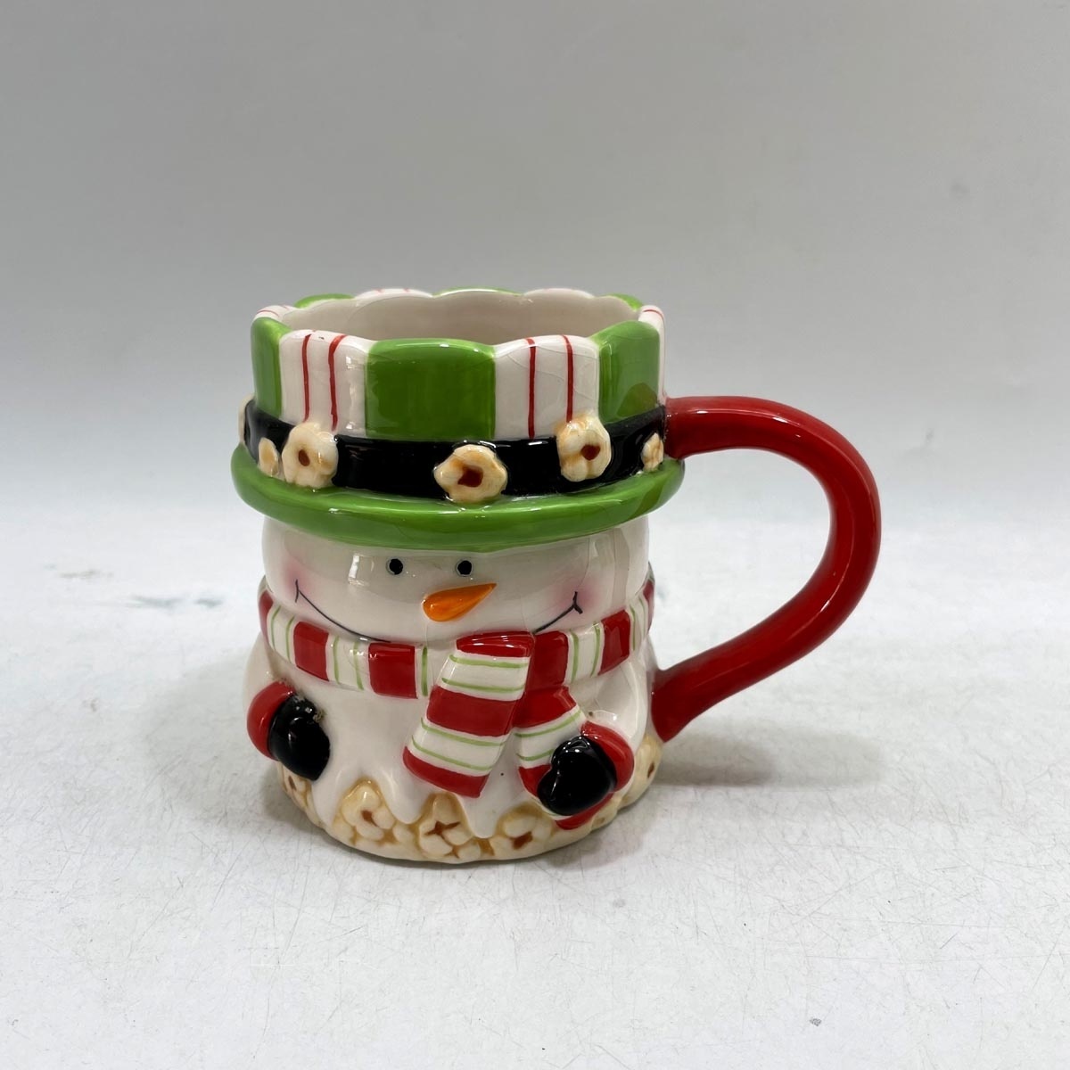 Handpainted ceramic popcorn snowman shaped coffee mugs