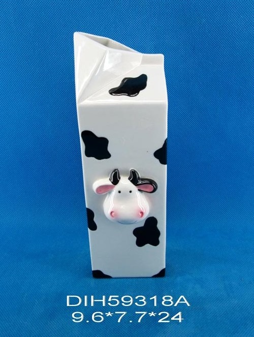 Hand-painted ceramic cow shaped kettle