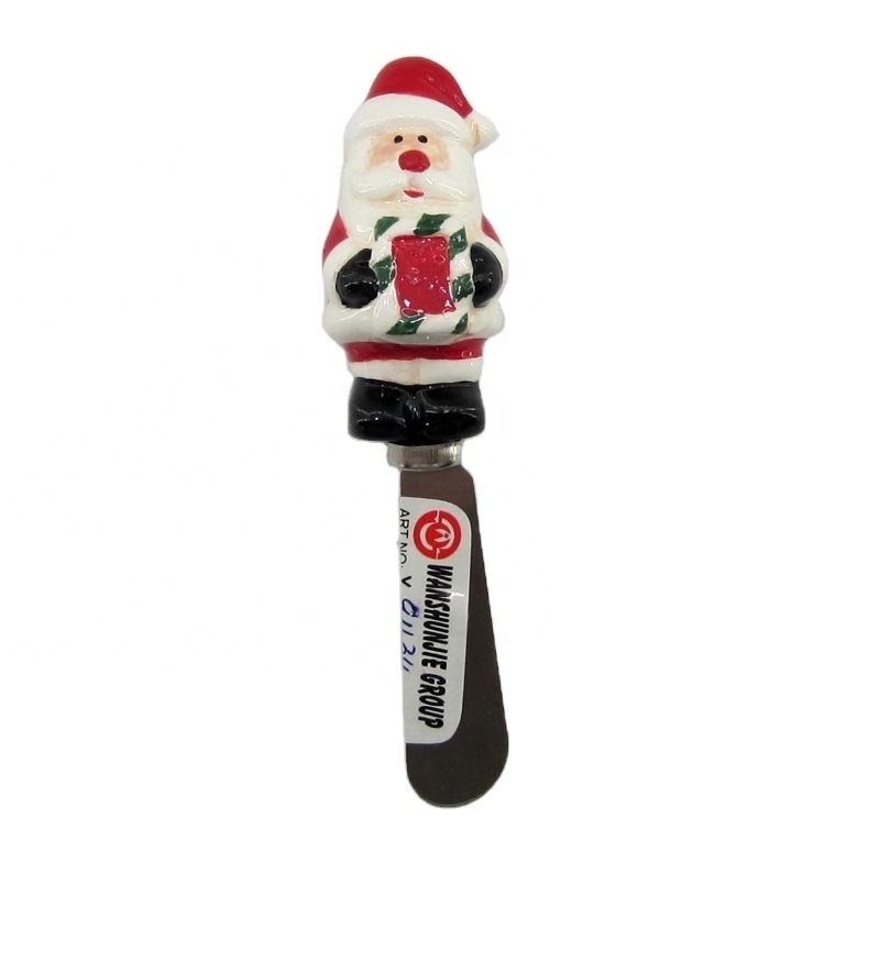 Spreader with ceramic santa handle for Christmas decoration