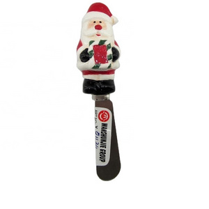 Spreader with ceramic santa handle for Christmas decoration