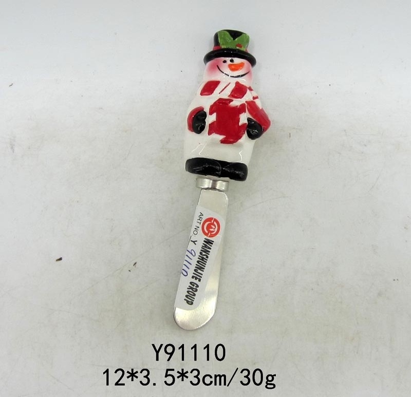 Spreader with ceramic santa handle for Christmas decoration