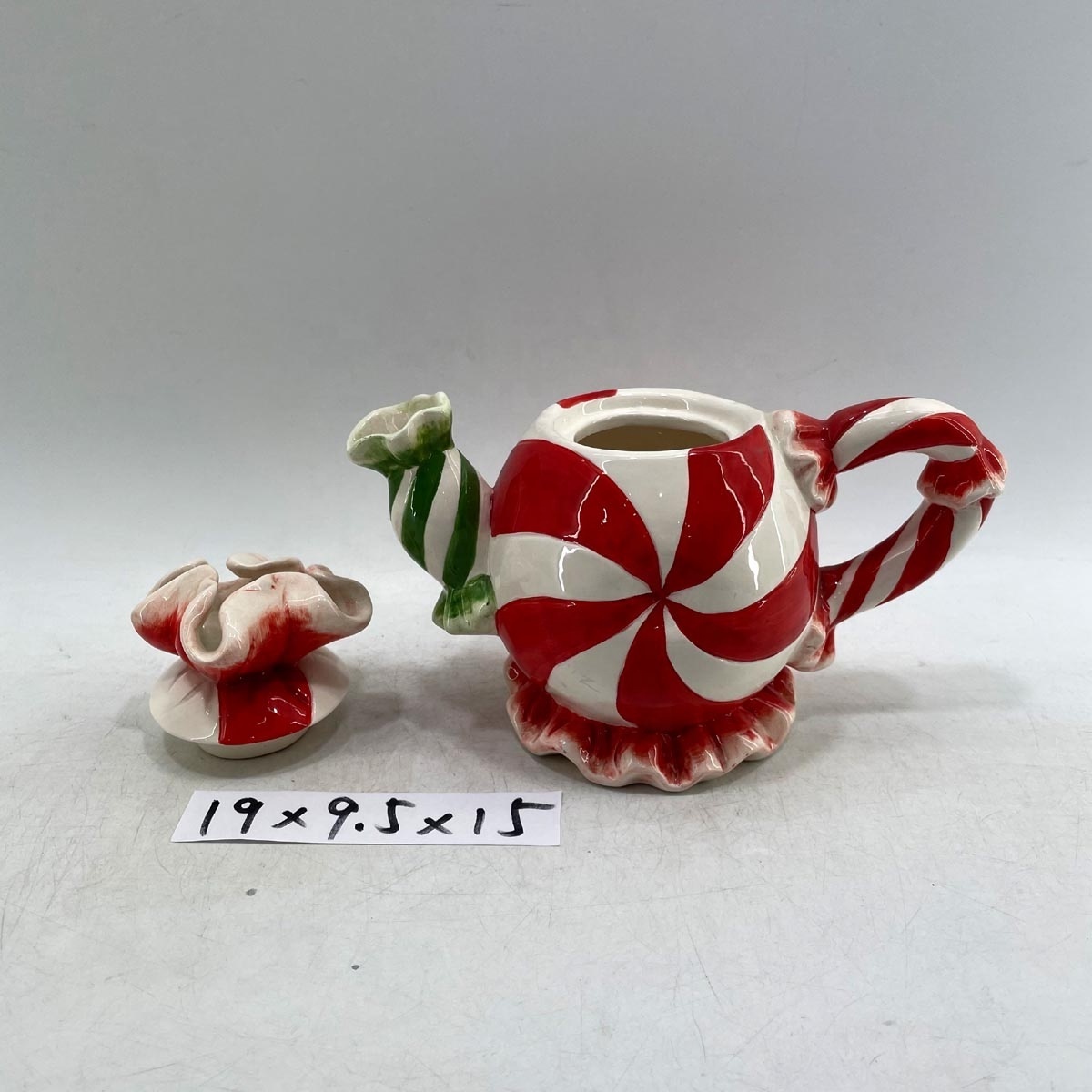 Hand-painted ceramic kettle for holiday decoration