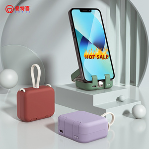 2024 new products 4000mah power bank built in cable portable battery powerbank as a back clip phone holder phone charger case