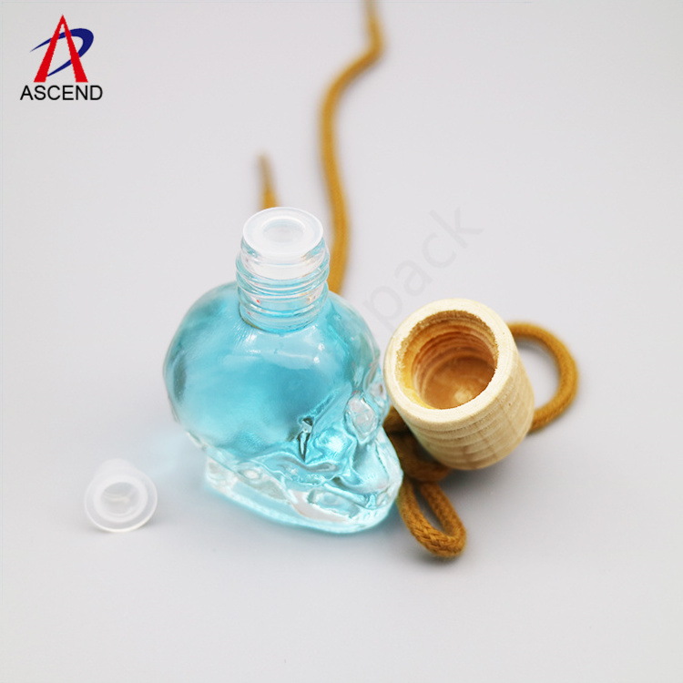 empty 8ml skull shaped car perfume bottle pendant aromatherapy perfume diffuser bottle with wooden lid and rope