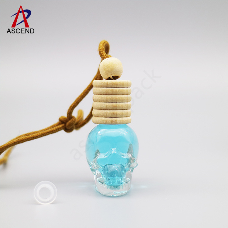 empty 8ml skull shaped car perfume bottle pendant aromatherapy perfume diffuser bottle with wooden lid and rope