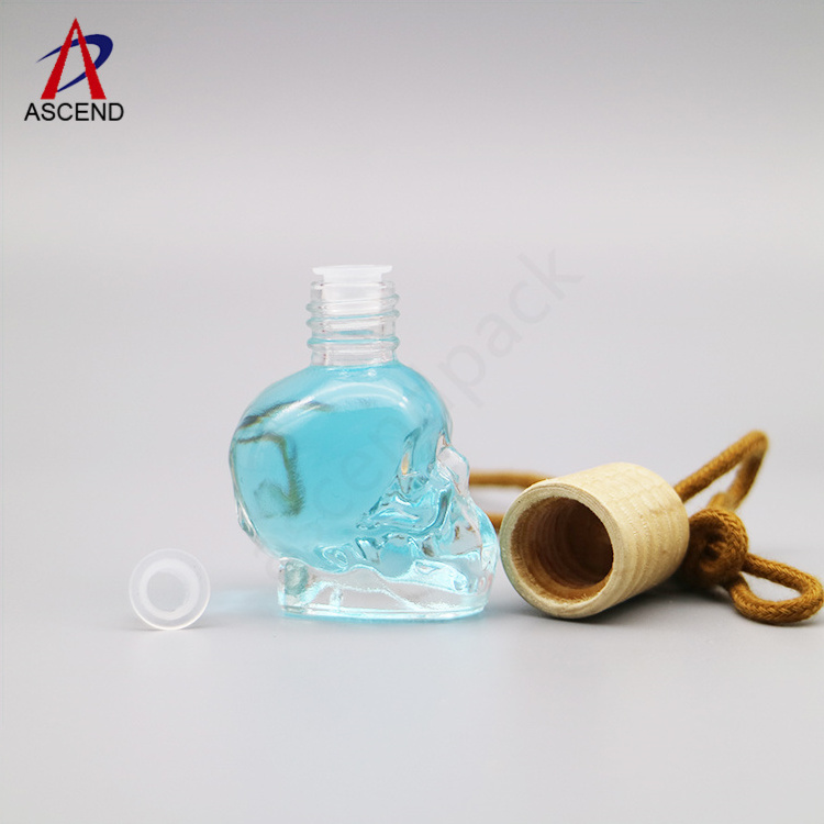 empty 8ml skull shaped car perfume bottle pendant aromatherapy perfume diffuser bottle with wooden lid and rope