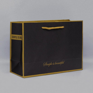 High Quality Thickened Kraft Paper Clothing Bag Black Kraft Paper Shopping Bag Sturdy And Durable With Customizable Logo