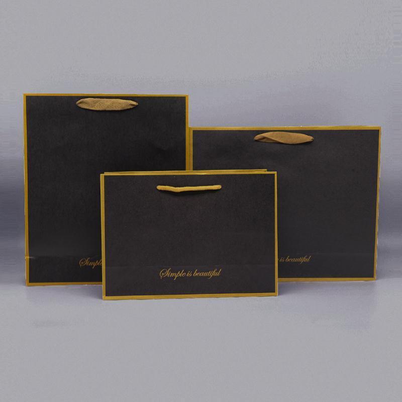 High Quality Thickened Kraft Paper Clothing Bag Black Kraft Paper Shopping Bag Sturdy And Durable With Customizable Logo