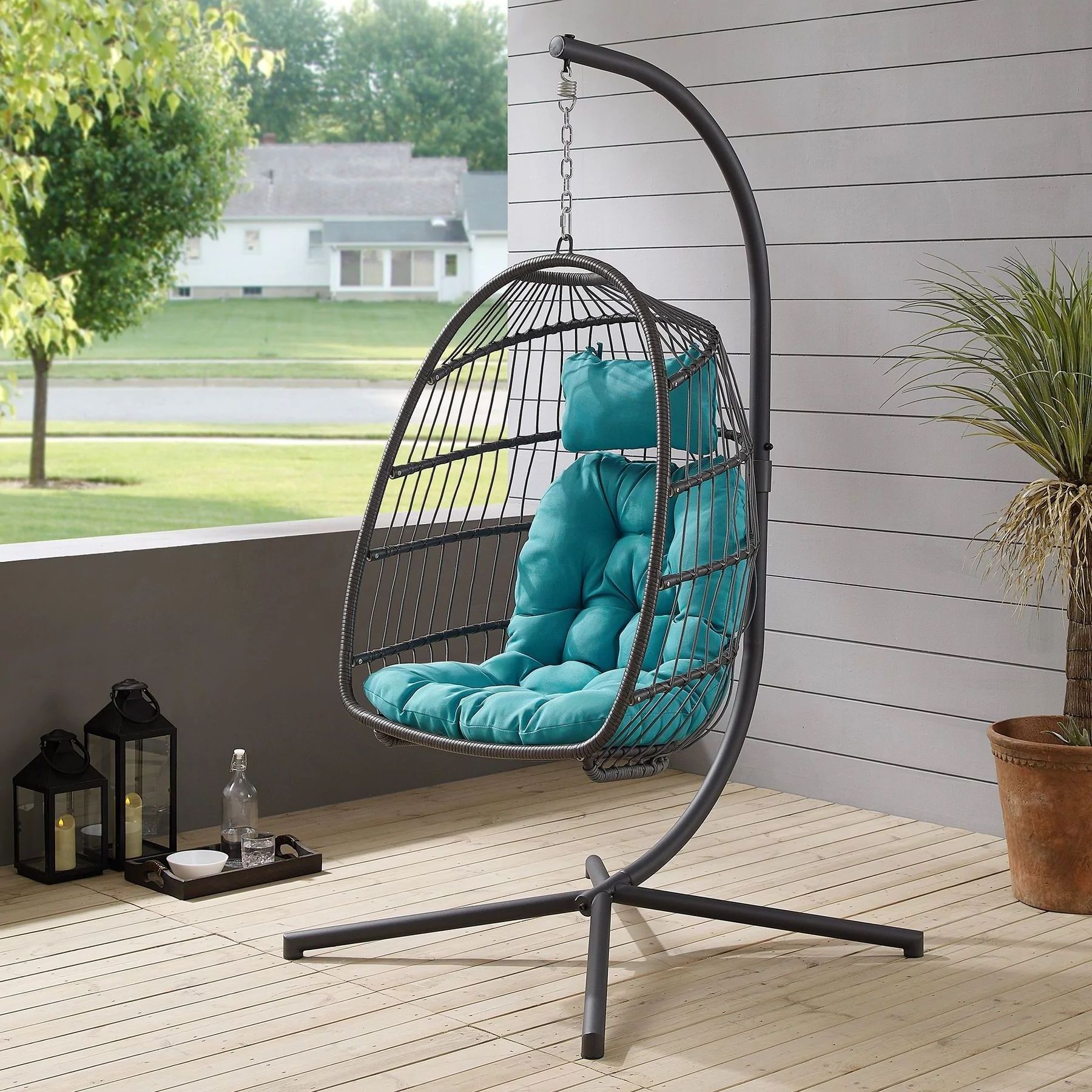 LeisureMod Patio Black Wicker Folding Hanging Egg Swing Chair in Pink