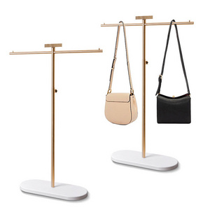 Height adjustable backpack display stand for retail market