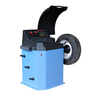 car wheel balancer with protective cover auto wheel balancing and repairing