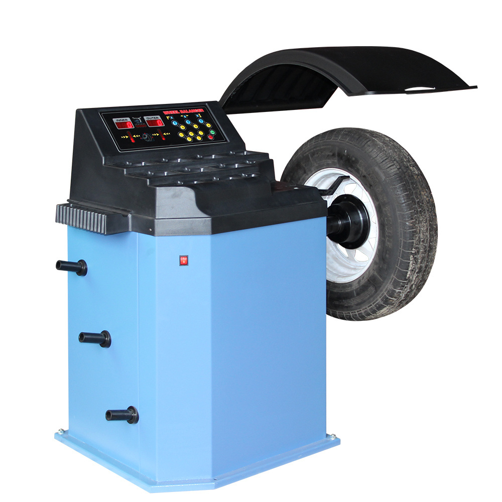 car wheel balancer with protective cover auto wheel balancing and repairing