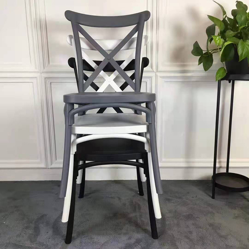 wholesale hot hotel luxury chair modern PP designer black plastic dining wedding chair cross back events chair for restaurant