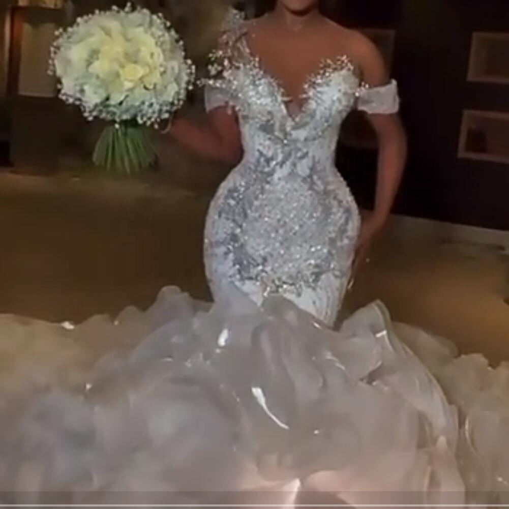 2024 Luxury Ruffles Mermaid Wedding Dresses Sheer Neck Silver Beaded Crystals Ruffles Tiered Plus Size Bridal Fish Tail Dresses