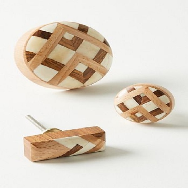 This cabinet knob is a unique mixture of resin and wood The brown wood merges well with the white resin The wood  grains and