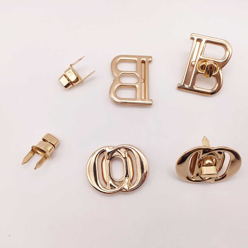 Wholesale New Design Letter Hollowed-Out Metal Turn Locks Custom Brand Letter Logo Push Twist Lock For Bag Accessories