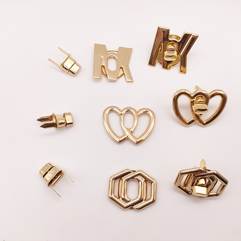 Wholesale New Design Letter Hollowed-Out Metal Turn Locks Custom Brand Letter Logo Push Twist Lock For Bag Accessories