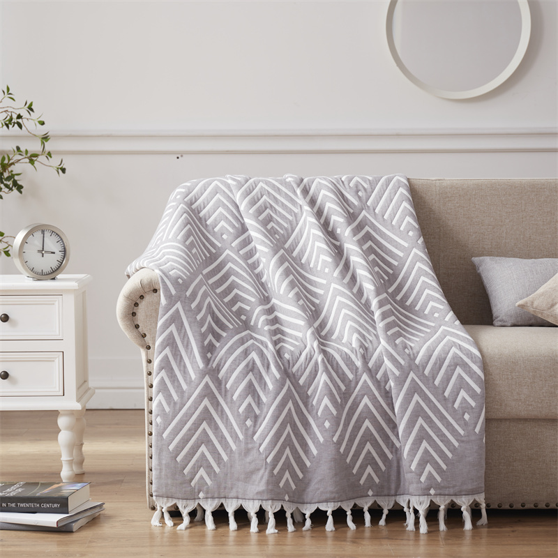 Market hot selling Super Soft Baby Machine wash Jacquard cotton Tassel woven blanket sofa for office use