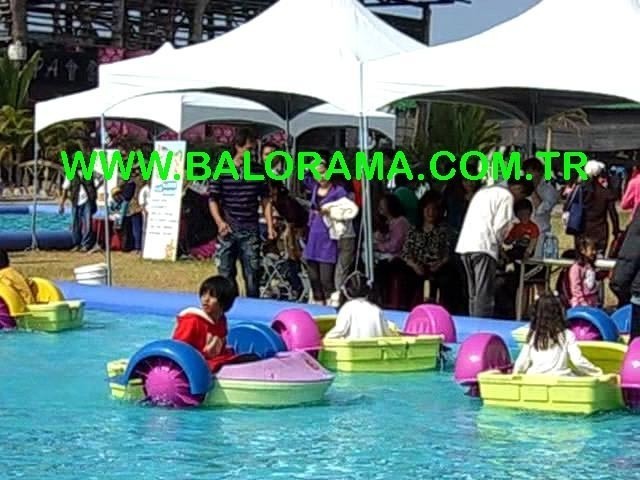 Paddle boats and inflatable pool