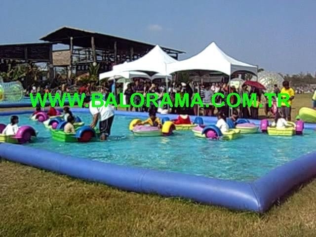 Paddle boats and inflatable pool