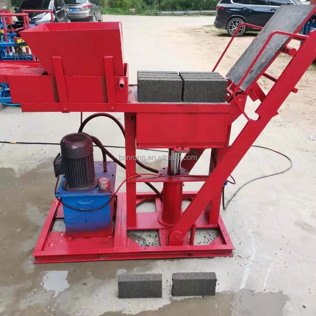 Hot selling manual press clay interlocking brick machine price