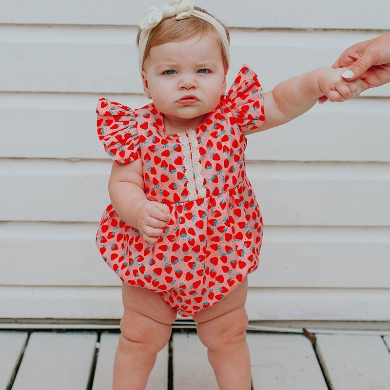 Girl's Strawberry Print Cotton Bubble Romper. The perfect first birthday party outfit, cake smash romper