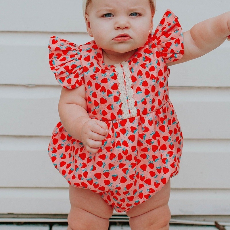 Girl's Strawberry Print Cotton Bubble Romper. The perfect first birthday party outfit, cake smash romper