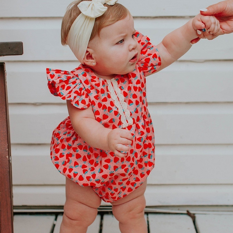 Girl's Strawberry Print Cotton Bubble Romper. The perfect first birthday party outfit, cake smash romper