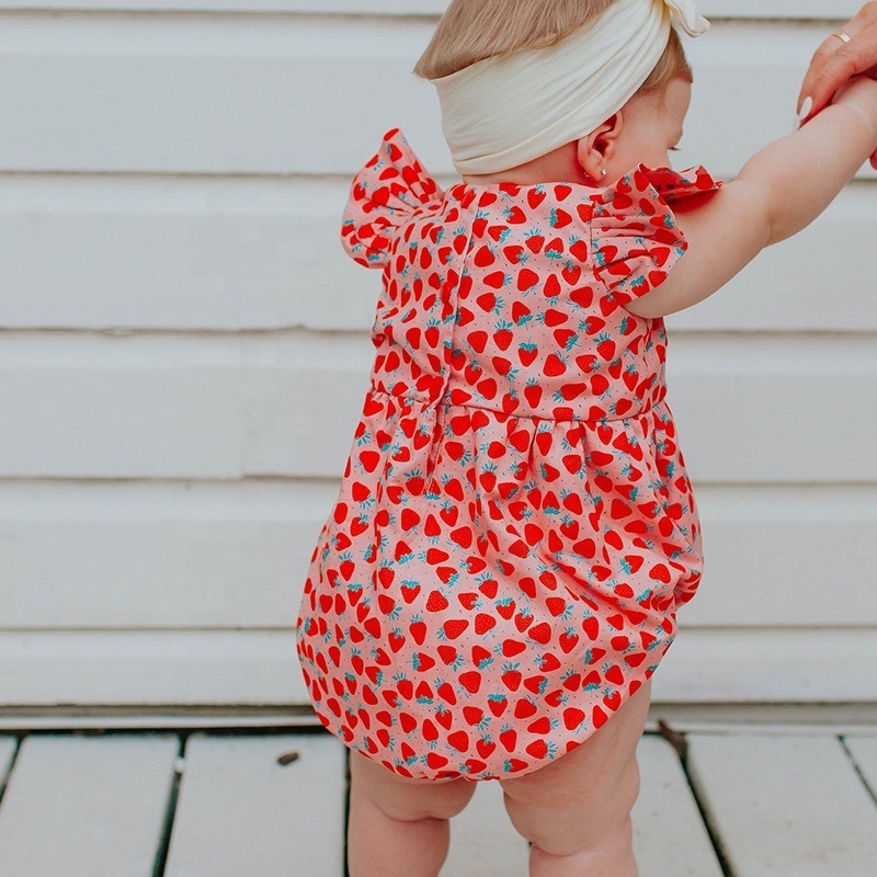 Girl's Strawberry Print Cotton Bubble Romper. The perfect first birthday party outfit, cake smash romper