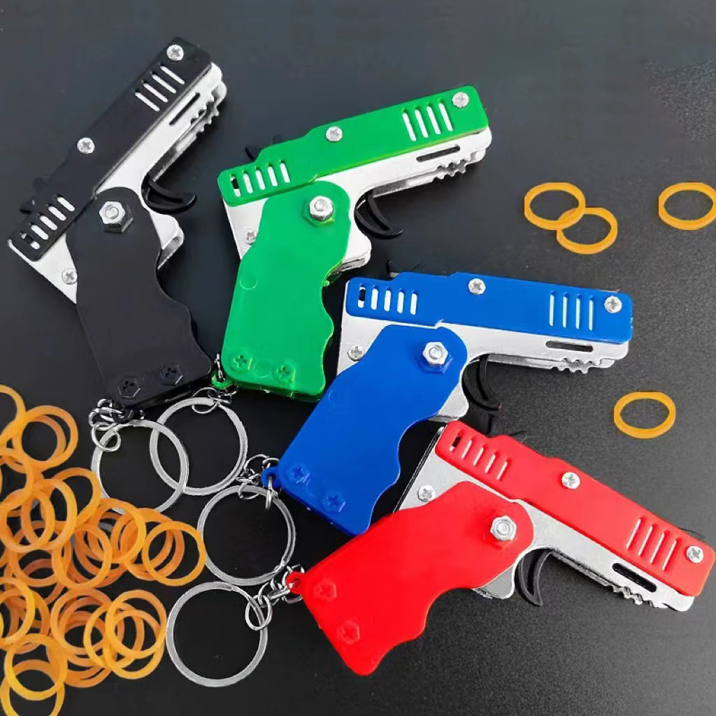 Mini Keychain Rubber Gun Elastic Leather Rubber Band Blaster Toys Shooting Pistol Kids Party Folding Elastic Rope Gun