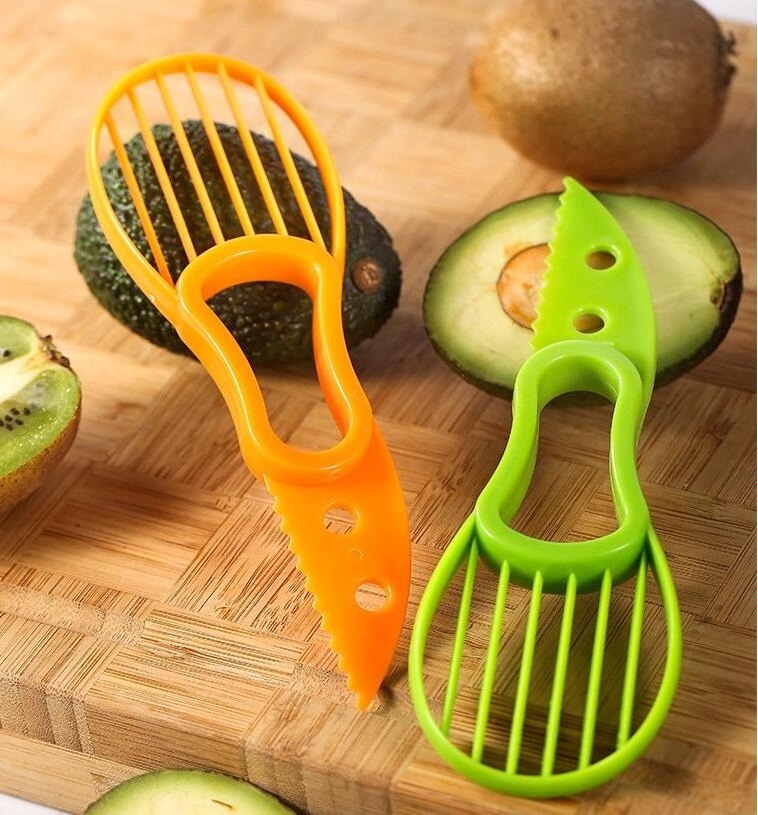 New product 2023 Hand hold plastic fruit cutter kiwifruit cutter avocado cutter kitchen gadgets for easy peeling and slicer