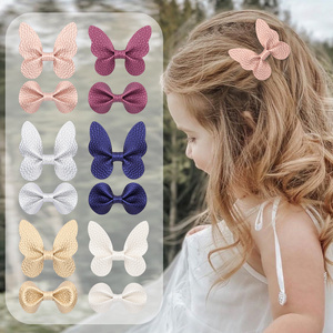 B.PHNE Wholesale girls hair accessories glitter pink pu candy butterfly bow hair clips for kids