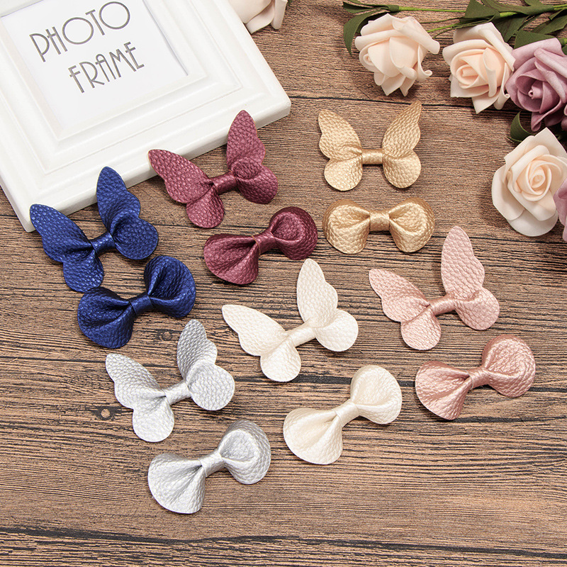 B.PHNE Wholesale girls hair accessories glitter pink pu candy butterfly bow hair clips for kids