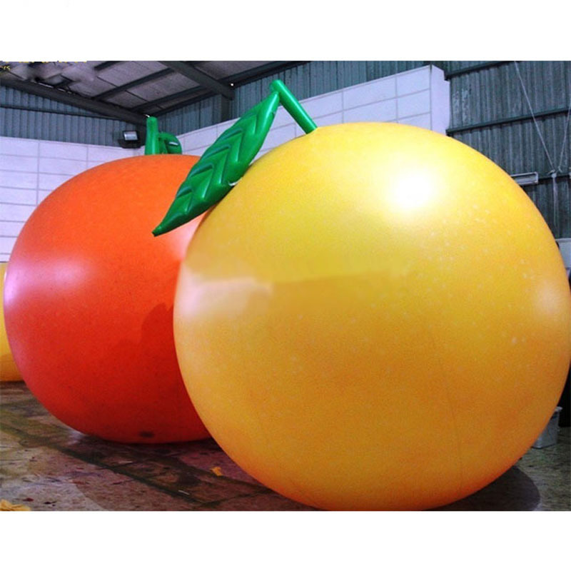 Customized cheap PVC inflatable peach balloon for sales