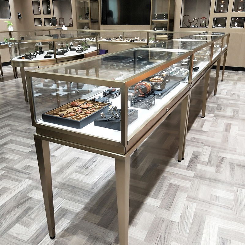 Gold Stainless Steel Jewelry Shop Display Cabinet Showcase Elegant Glass Jewelry Display Counter with Lights For Jewelry Store