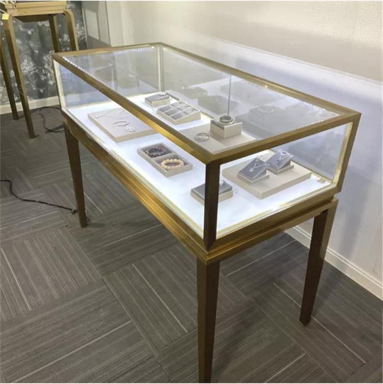 Gold Stainless Steel Jewelry Shop Display Cabinet Showcase Elegant Glass Jewelry Display Counter with Lights For Jewelry Store