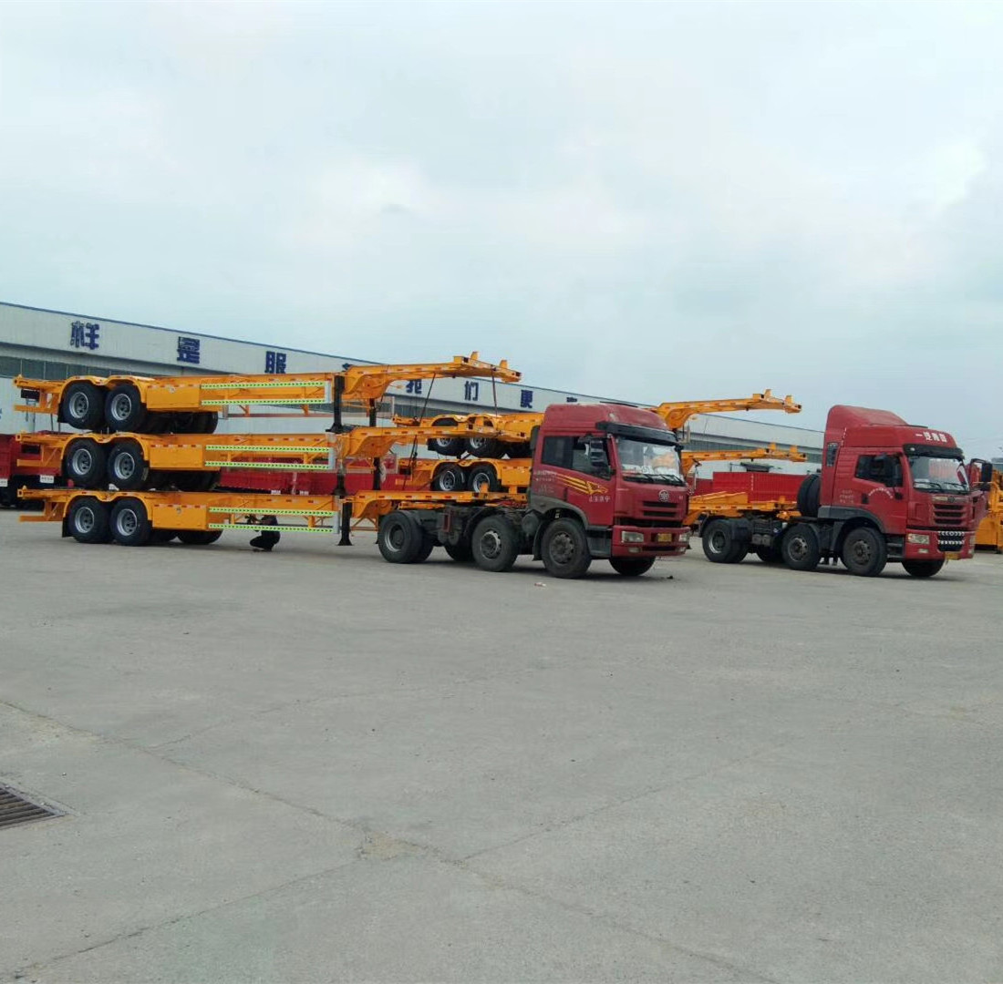 China strong 2/3 axles 20 40 foot 40tons container carrier chassis flatbed skeleton semi trailer