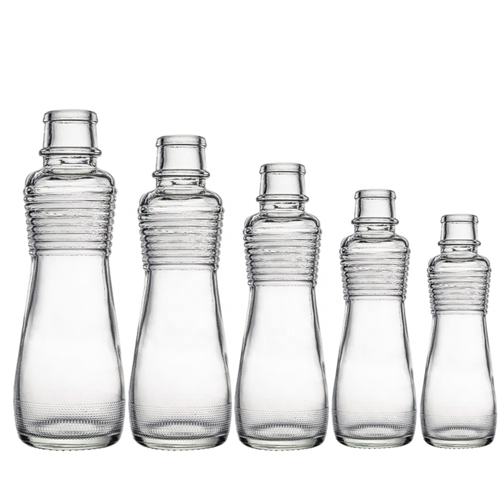 Berlin Packaging Transparent Round Sesame Seed Oil Bottle Different Sizes Unique Glass Hot Sauce Cooking Olive Oil Bottle