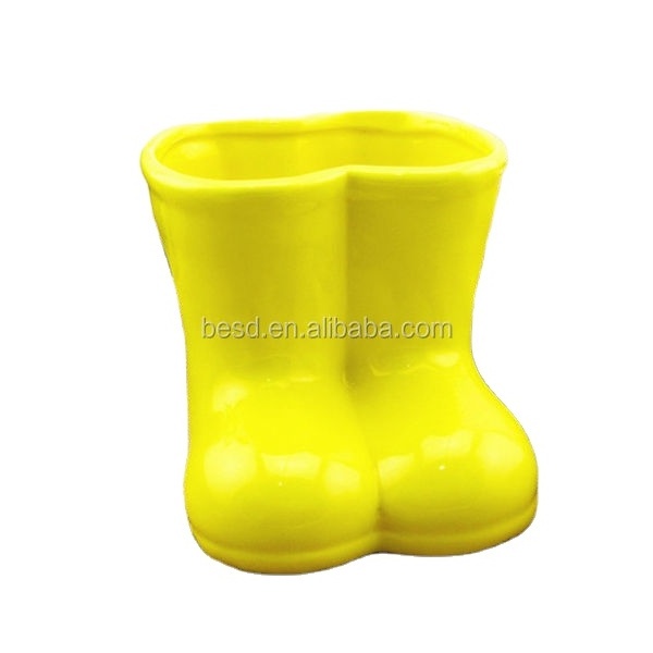 yellow glazed decorative cowboy boot ceramic flower vase