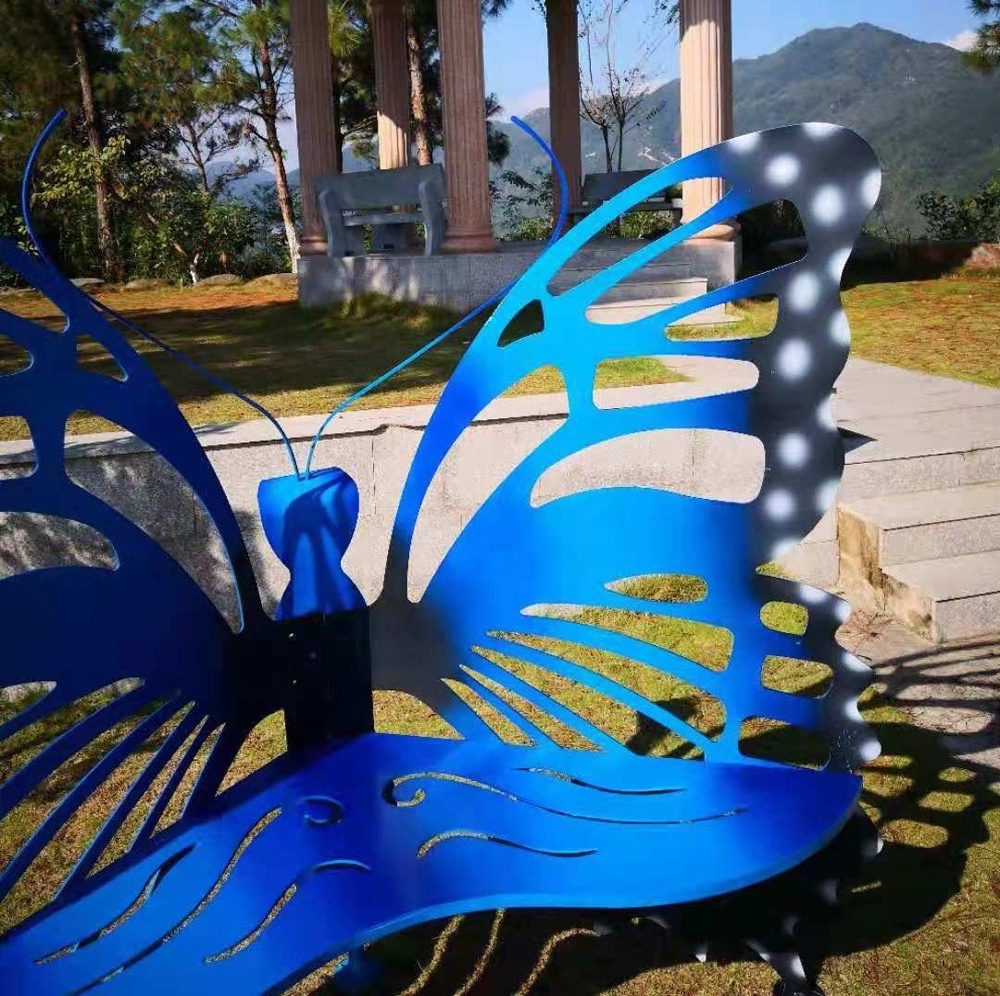 outdoor iron art park bench with butterfly sculpture for sale