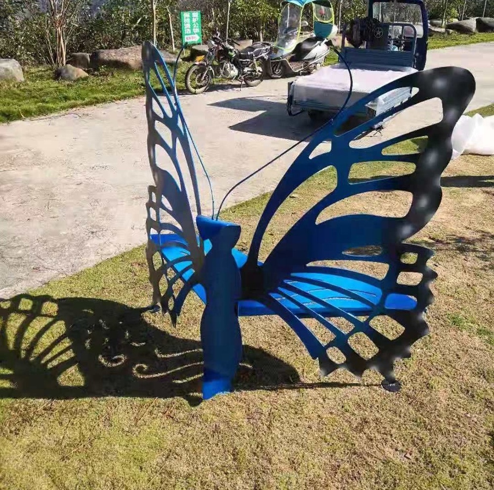 outdoor iron art park bench with butterfly sculpture for sale